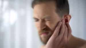 Man feels pain in middle ear meningitis and hearing loss